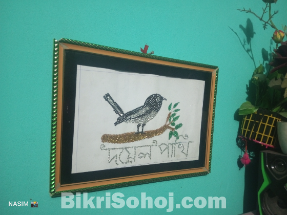 পুতি বসা দোয়েল পাখির ওয়ালমেট